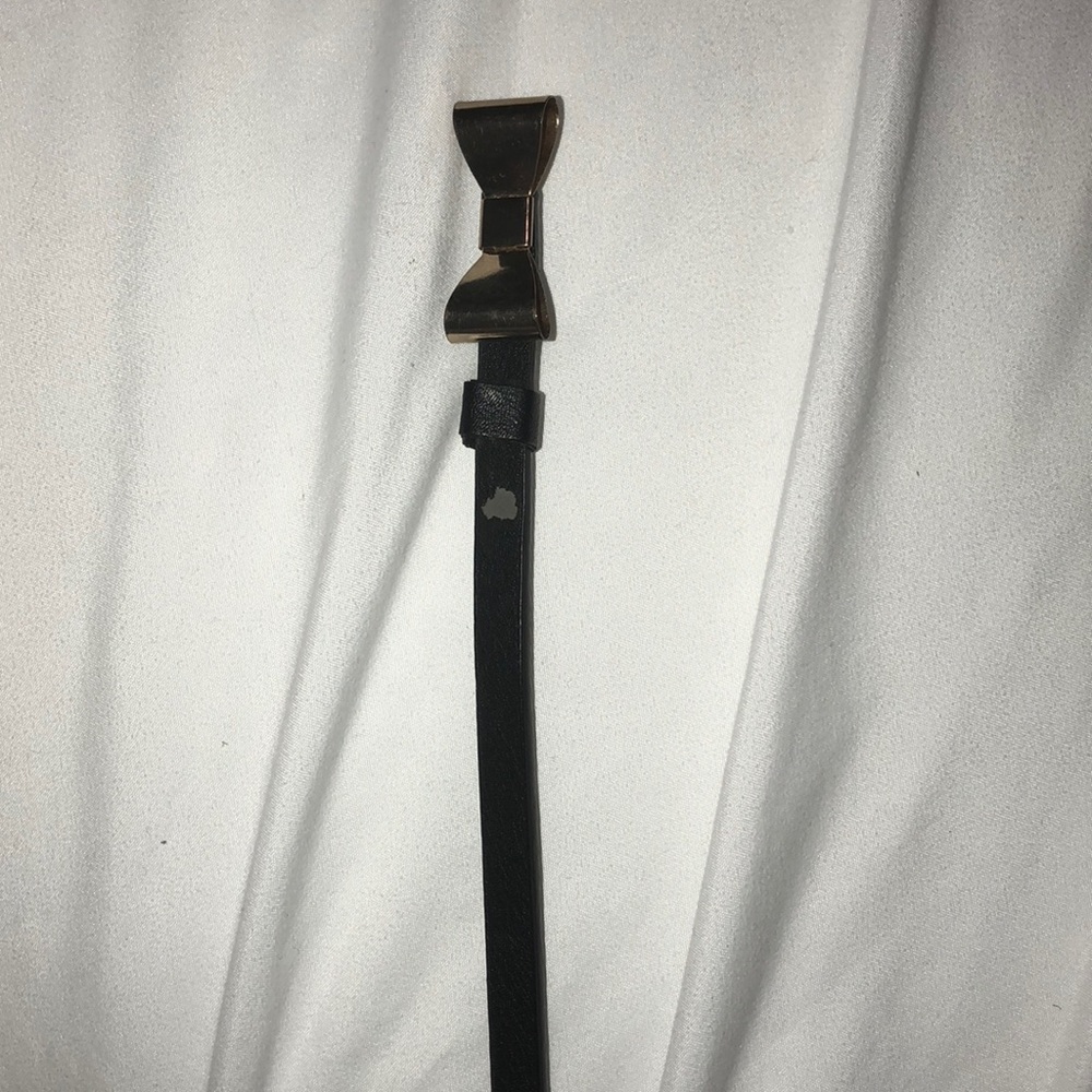 Black waist belt with gold bow